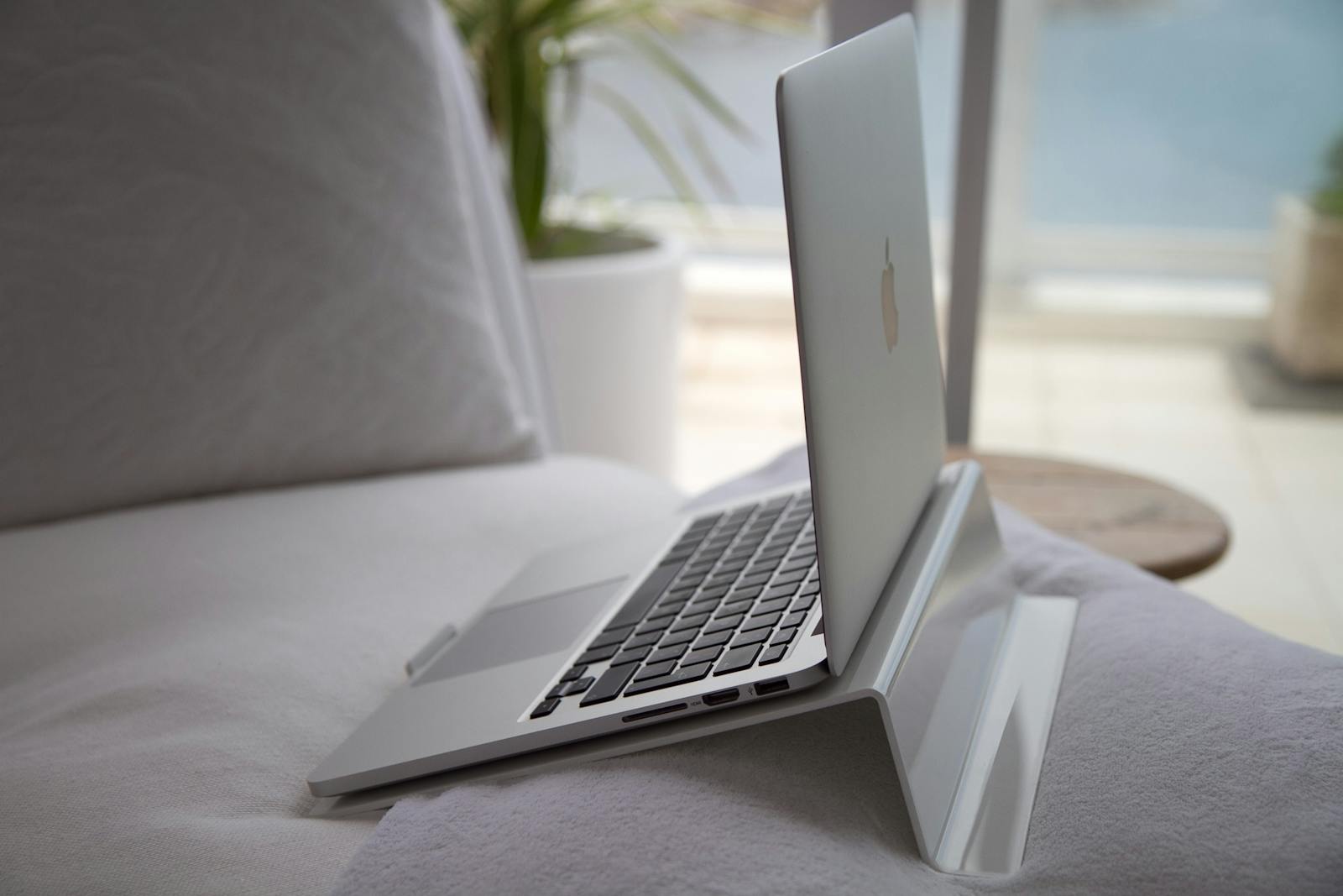 Laptop on a desk in a modern workspace, representing secure business software and SAP CPQ security.