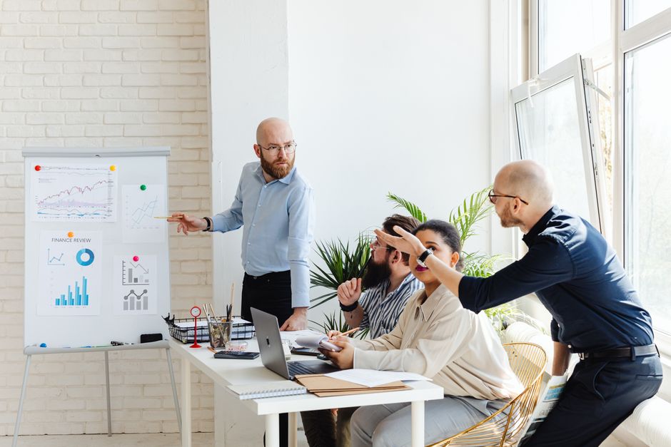 Enterprise sales team reviewing the SAP SD quote-to-cash process in a modern office