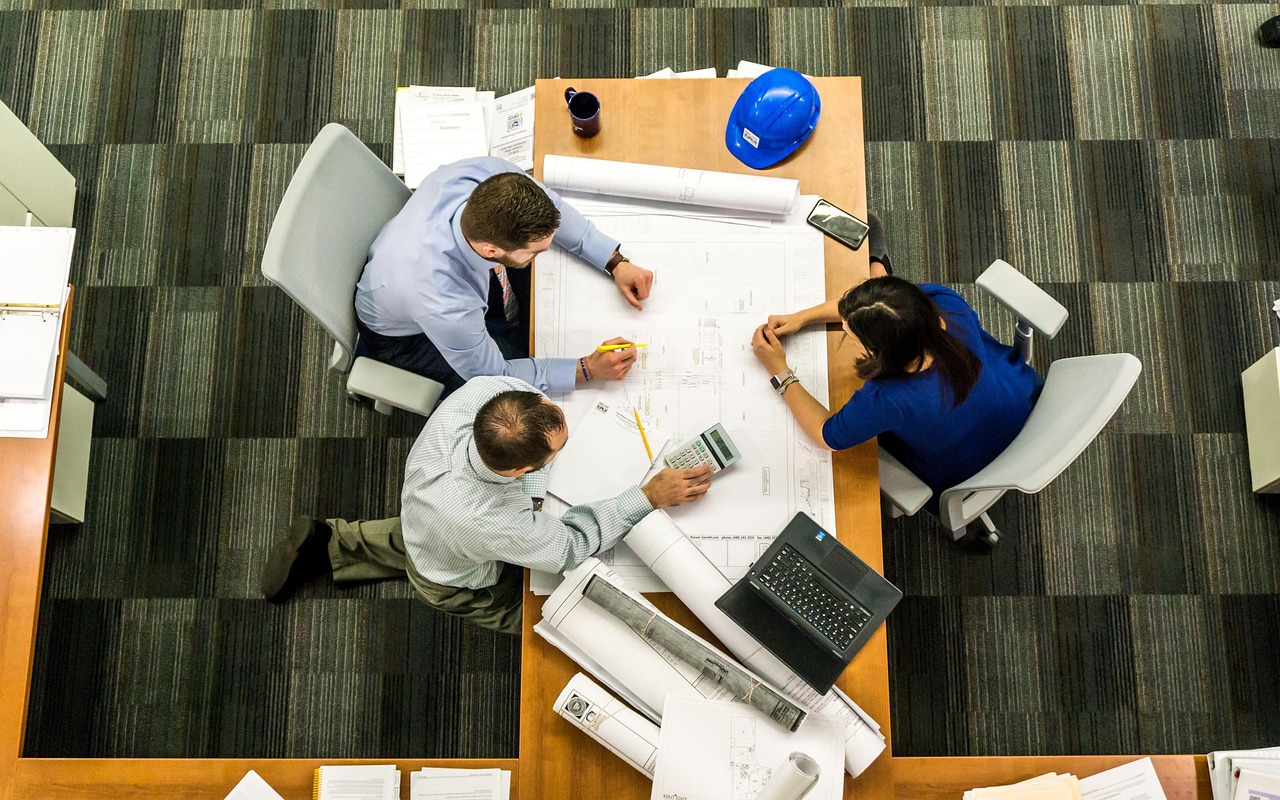 Enterprise team reviewing SAP configuration logic and product rules during a project
